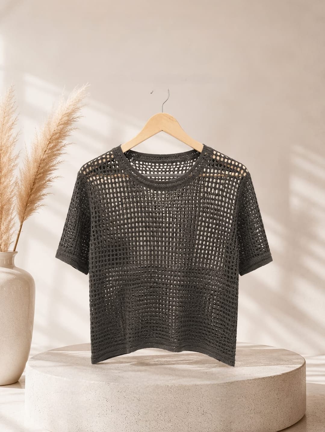vibrant black open-stitch mesh crochet crop top